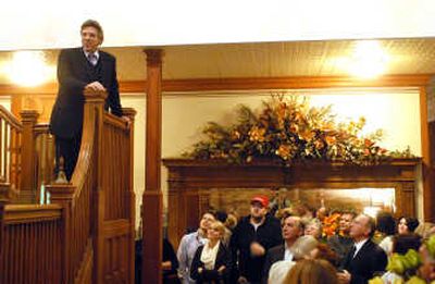 
Baritone Thomas Hampson, left, offers a few words to symphony benefactors while standing on a staircase landing at the home of Frank and Sherry Knott during an invitation-only reception held Dec. 28, 2007. Hampson performed at the Fox Theater the next night. 
 (Photos by Jesse Tinsley / The Spokesman-Review)