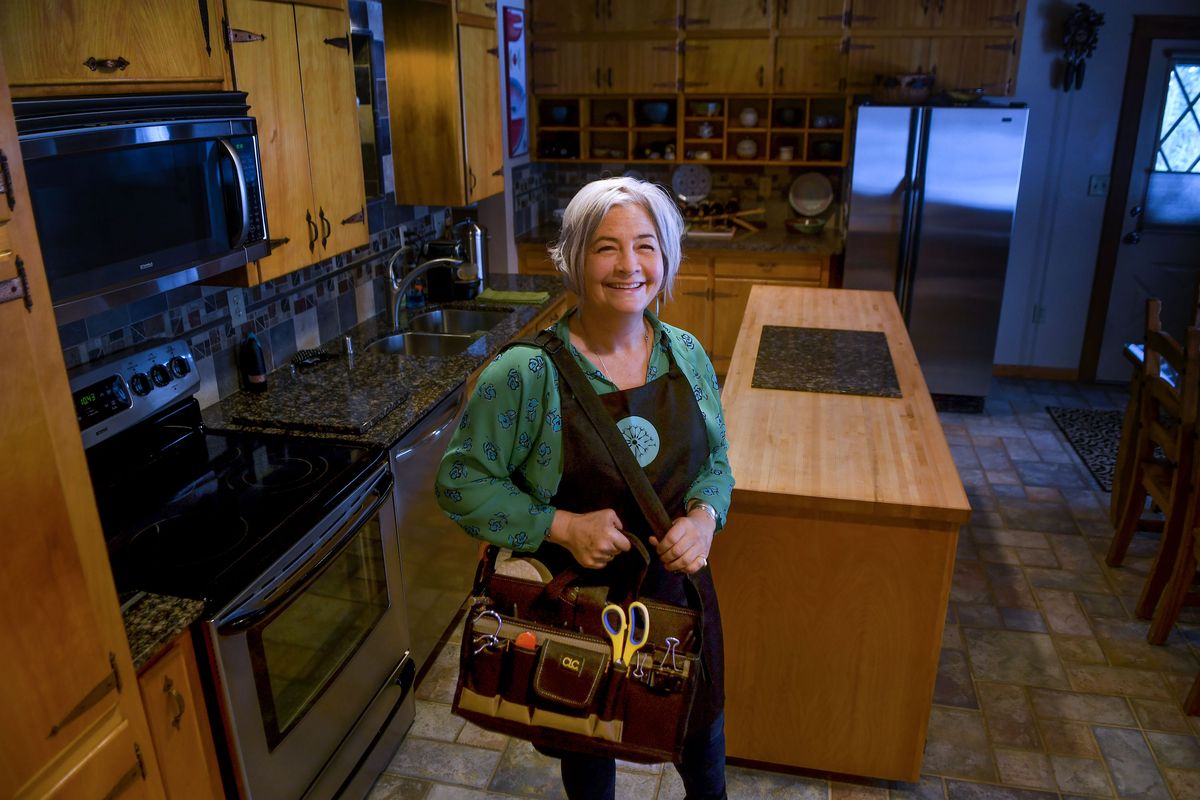 Angela Johnstone, a Silver Lining Tidying Artist and certified Kondo organizer, is photographed in her home in Spokane on Jan. 14.  (Kathy Plonka/The Spokesman-Review)