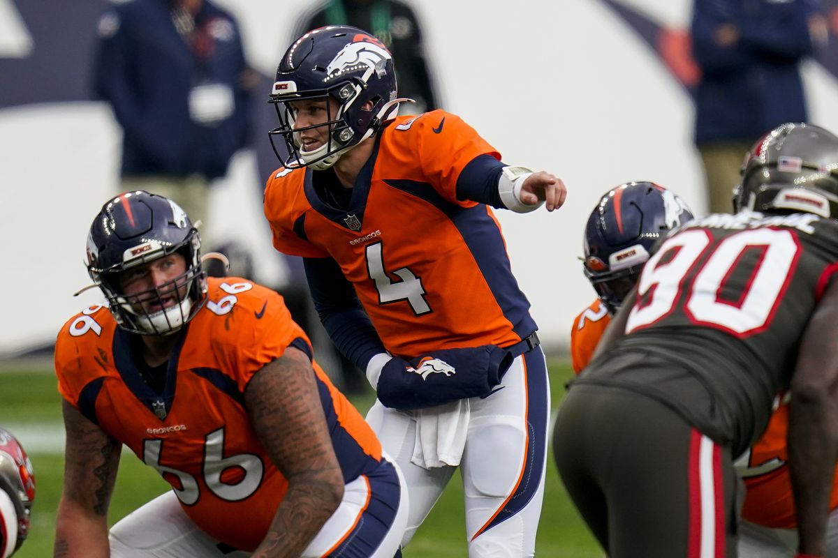 Denver Broncos quarterback Brett Rypien (4) signals against the Tampa Bay Buccaneers during an NFL football game, Sunday, Sept. 27, 2020, in Denver. (Associated Press)