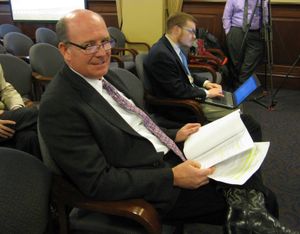 House Majority Leader Mike Moyle, R-Star, prepares to present his dangerous-dog legislation to the House Agriculture Committee on Wednesday afternoon (Betsy Z. Russell)