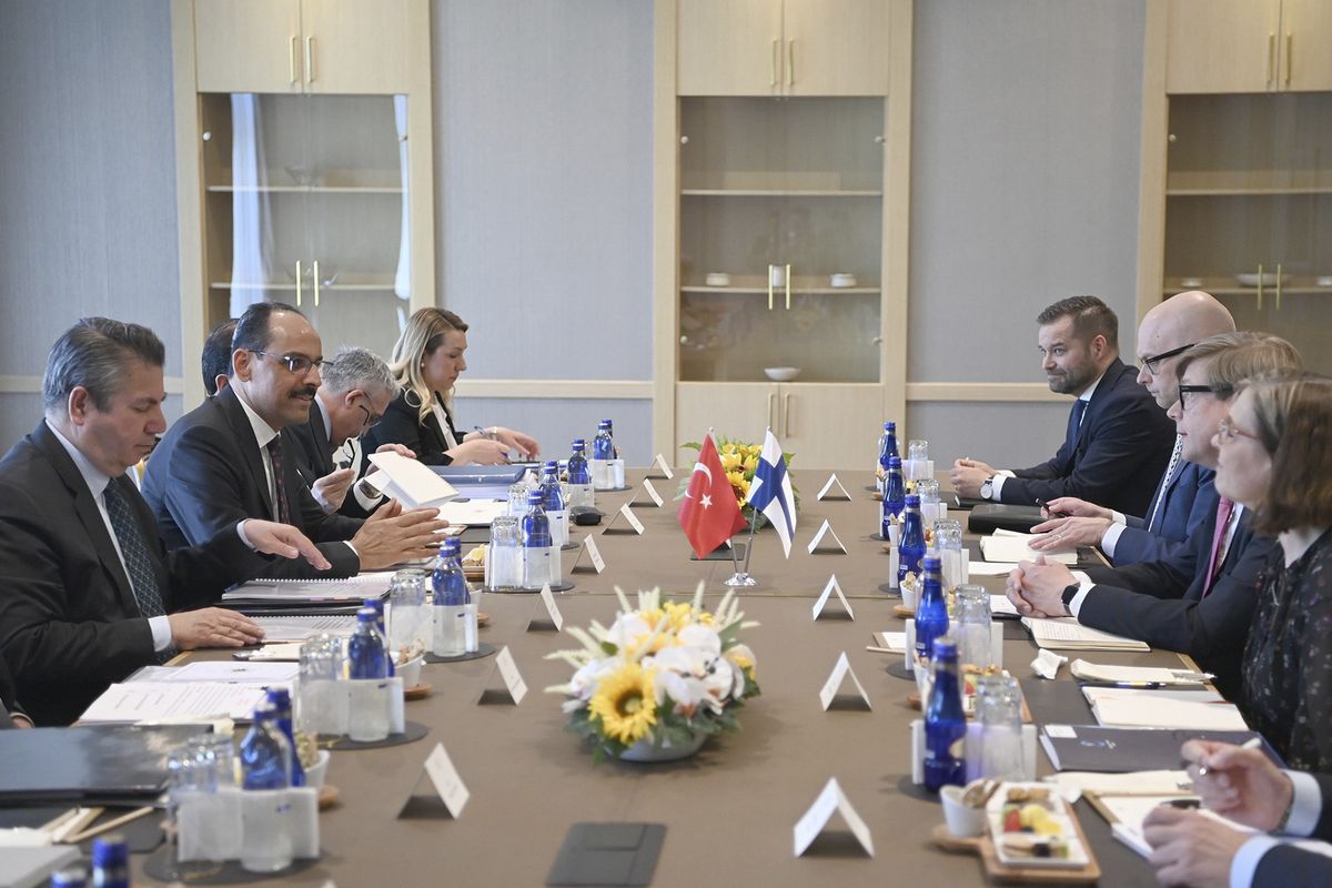 Ibrahim Kalin, the spokesman of President Recep Tayyip Erdogan, second left, and Turkish delegation speak with Finnish delegation headed by Jukka Salovaara, the Foreign Ministry Undersecretary, third right, in Ankara, Turkey, Wednesday, May 25, 2022. Senior officials from Sweden and Finland met with Turkish counterparts in Ankara on Wednesday in an effort to overcome Turkey