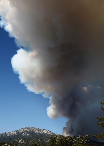 Smoke from the Mountain Fire fills the sky Friday in Pine Cove, Calif. (Associated Press)