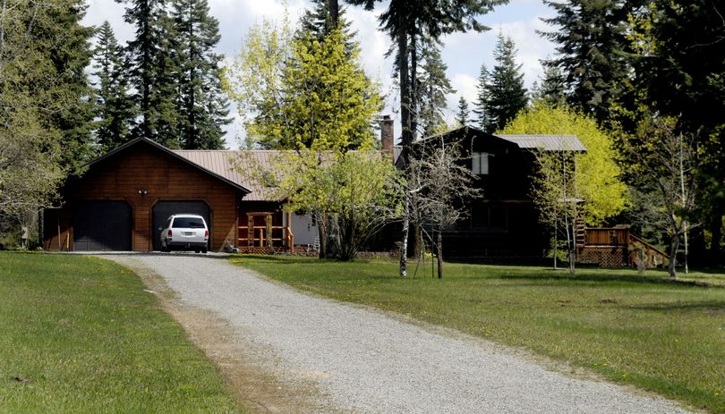 A court filing says Officer Karl F. Thompson Jr. lives rent- free in this Hayden house. As part of a September 2009 divorce filing, Thompson gave his wife all interest in the log home, which for a time was for sale for $675,000. (Kathy Plonka)