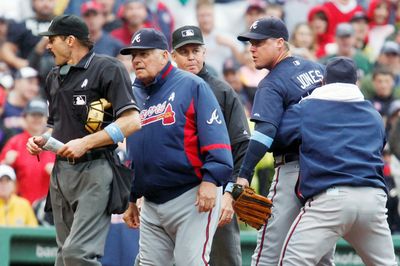 Bobby Cox, second from left, Chipper Jones, second from right, and Eric O’Flaherty were ejected by Bill Hohn. (Associated Press / The Spokesman-Review)
