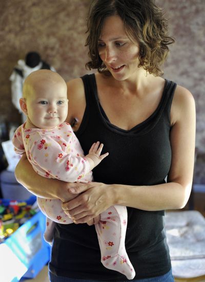 Kandace O’Neill’s 7-month-old girl has received no federally recommended vaccinations. (Associated Press)