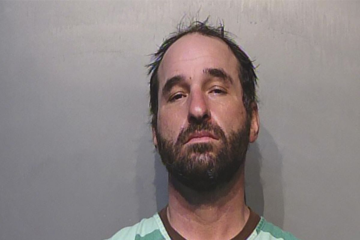 FILE - This undated photo provided by Polk County, Iowa Jail shows Douglas Jensen. A prosecutor says Jensen, a QAnon follower, seen in a videotaped confrontation with a police officer during the Capitol insurrection violated terms of his release by watching internet videos about the Jan. 6, 2021, attack and should be returned to custody until trial. (HOGP)