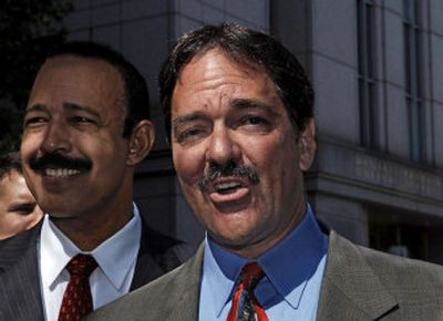 
Frank Quattrone makes a statement Tuesday in front of Manhattan federal court with his attorney Theodore Wells. His deal lets him work in finance again.
 (Associated Press / The Spokesman-Review)
