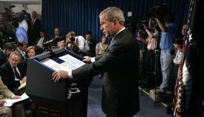 
During a press conference on Monday, President Bush changed his rhetoric regarding Iraq by not mentioning any unseen progress.  
 (Associated Press / The Spokesman-Review)