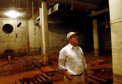 
Peter Davenport stands in the control room of a former nuclear missile base that is now home to the National UFO Reporting Center's files just outside Harrington, Wash.Associated Press
 (Associated Press / The Spokesman-Review)