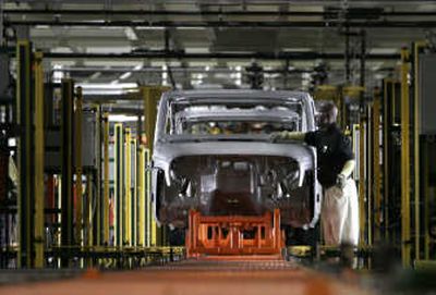 
A worker inspects a Jeep on the assembly line at the Chrysler Jeep plant in Toledo, Ohio.Associated Press
 (File Associated Press / The Spokesman-Review)