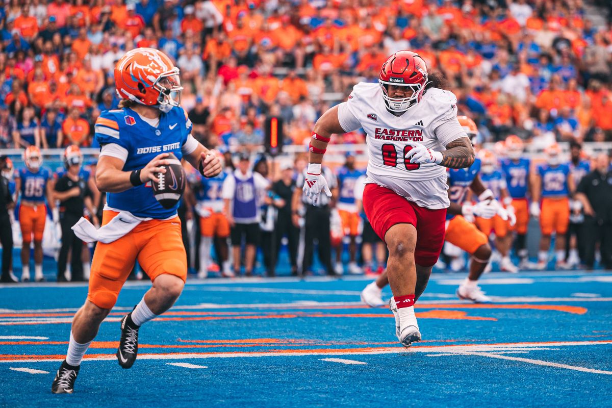Boise State quarterback Maddux Madsen looks to pass with Eastern Washington defensive tackle Jirah Leaupepetele in pursuit on Friday at Albertsons Stadium in Boise.  (Courtesy of EWU Athletics)