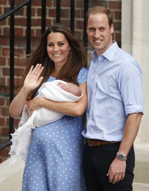 The Duke and Duchess of Cambridge leave the Lindo Wing of St Mary's Hospital in London Tuesday July 23 2013, carrying their new-born son, the Prince of Cambridge, who was born Monday, into public view for the first time. The boy will be third in line to the British throne. (Jonathan Brady / Pa)