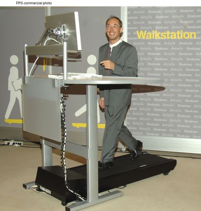 Dr. James Levine, of the Mayo Clinic in Rochester, Minn., demonstrates how to operate the Walkstation at the Steelcase showroom in Manhattan in 2007.