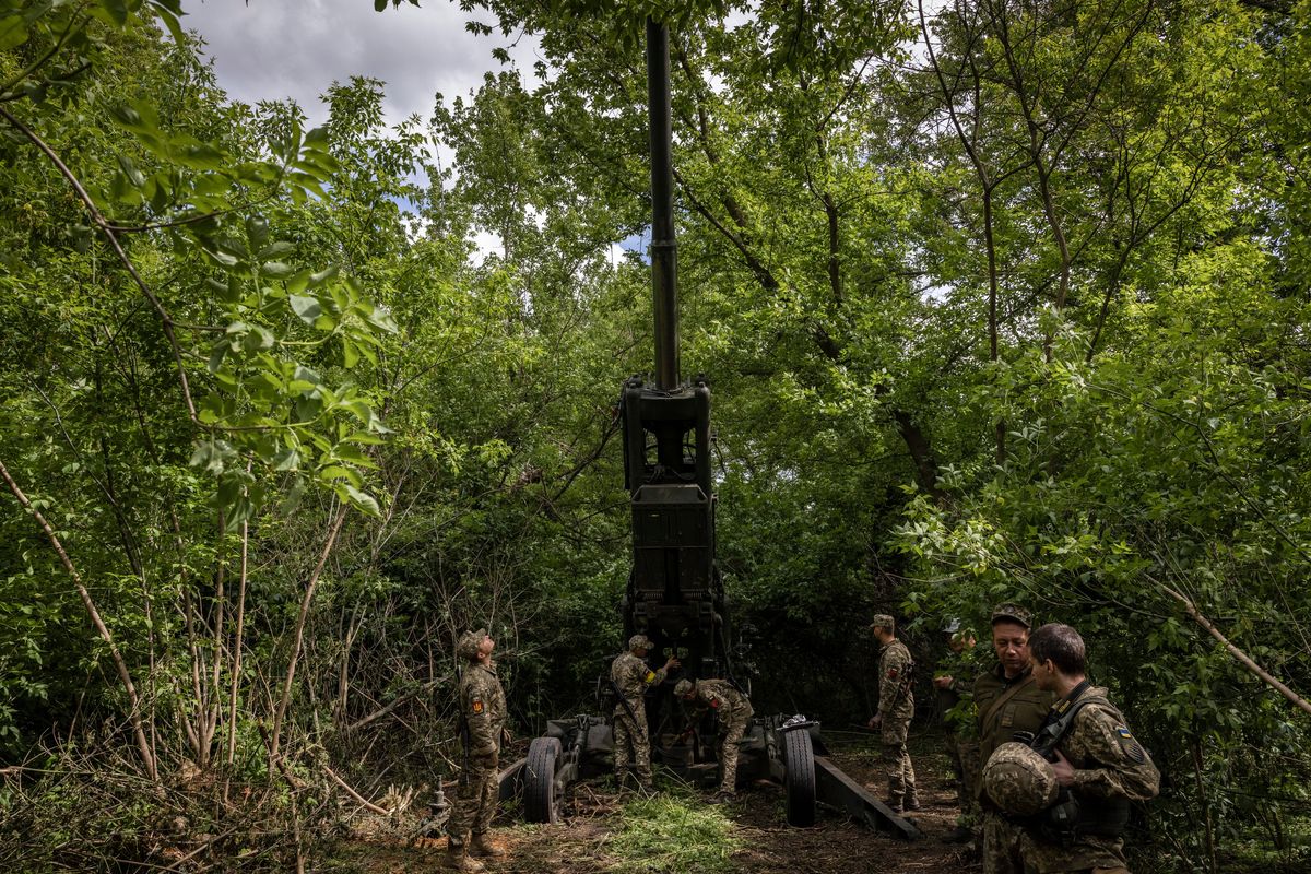 FILE – Ukrainian soldiers with an American-made M777 howitzer in the Donetsk region of Ukraine, May 22, 2022. Despite expectations that Russia’s invasion of Ukraine would force Europe to bolster its military strength, it has instead reinforced dependency on U.S. leadership, intelligence and might. (Ivor Prickett/The New York Times)  (IVOR PRICKETT)