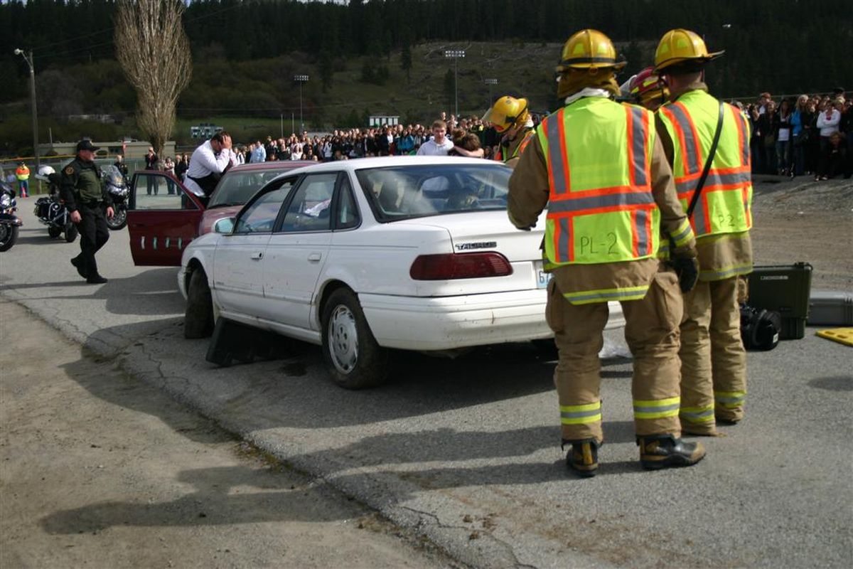 Spokane Valley Fire Department crews participate in a mock crash at East Valley High School on May 3, 2011. Photo courtesy the Spokane Valley Fire Department. (Photo courtesy Spokane Valley Fire Department)