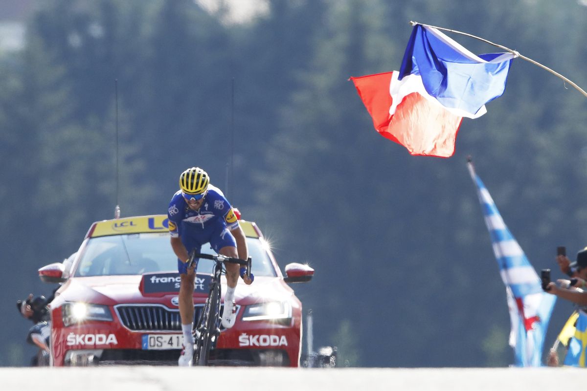 France’s Julian Alaphilippe rides to cross the finish line to win the tenth stage of the Tour de France cycling race over 158.8 kilometers (98.7 miles) with start in Annecy and finish in Le Grand-Bornand, France, Tuesday, July 17, 2018. (Christophe Ena / Associated Press)