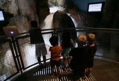 
hildren watch a flash flood exhibit at the Las Vegas Springs Preserve. The 180-acre facility opened in June after years of planning and an infusion of $250 million reaped from the sale of federal land around fast-growing Las Vegas. The Associated Press
 (Photos by Jae C. Hong The Associated Press / The Spokesman-Review)