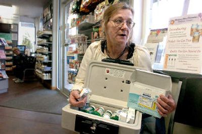 
Dee Daly, shown at the Medicine Man pharmacy in Hayden, takes as many as 22 medications daily for a variety of ailments, such as neck and headache pain, hypertension, high cholesterol, depression, and Crohn's disease.
 (Jesse Tinsley / The Spokesman-Review)