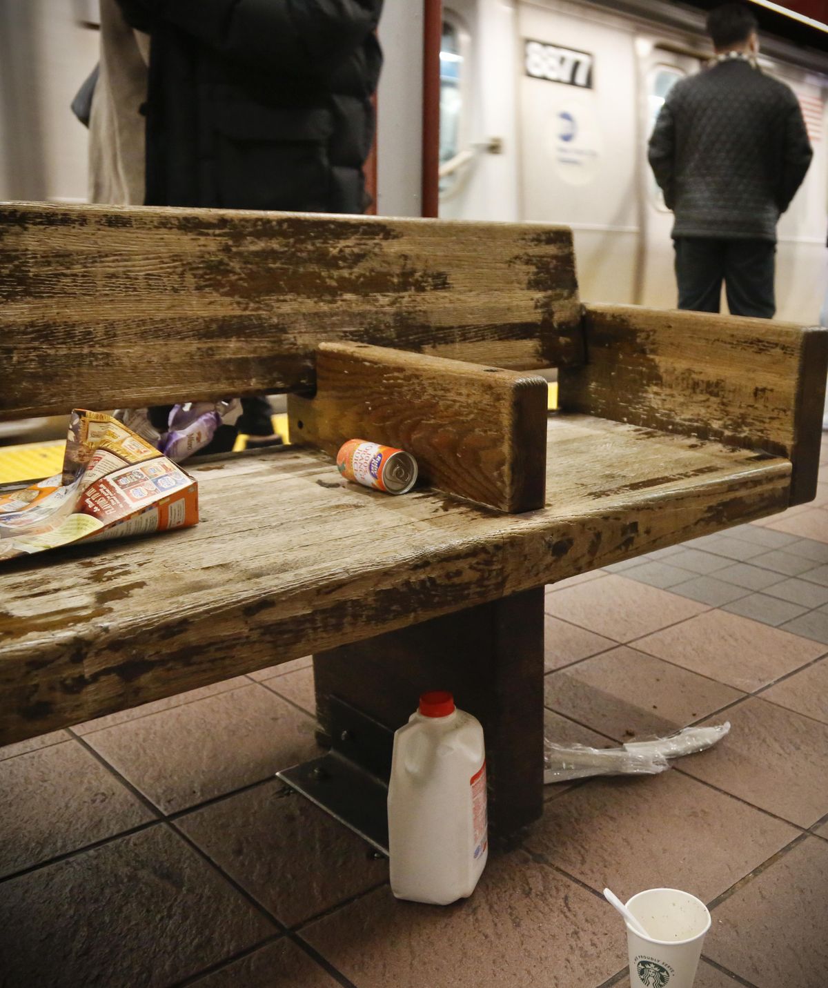 Trash collects around a bench on a subway platform, Thursday, in New York. Faced with the problem of too much litter and too many rats in their subway stations, New York City transit officials began an unusual social experiment a few years ago. They removed trash bins entirely from select stations, figuring it would deter people from bringing garbage into the subway in the first place. This week, they pulled the plug on the program after reluctantly concluding that it was a failure. (Bebeto Matthews / Associated Press)