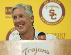 University of Southern California football coach Pete Carroll comments on his leaving to become coach of the Seattle Seahawks during a news conference at the USC campus in Los Angeles on Monday, Jan 11, 2010.   Carroll says the only reason he is leaving Southern California to become Seattle Seahawks coach is because the challenge was too good to pass up. (Damian Dovarganes / Associated Press)