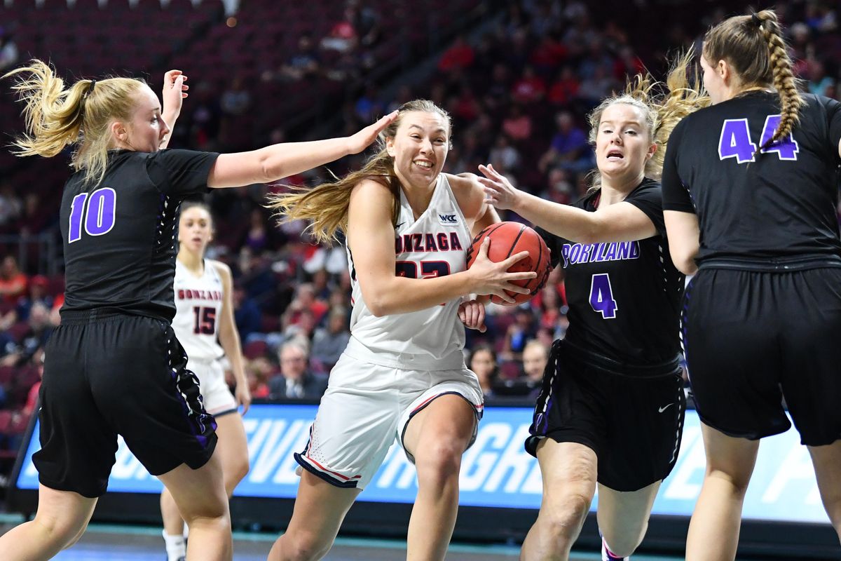 Gonzaga Bulldogs guard Jill Townsend (32) drives to the hoop against the Portland Pilots defense during the first half of a West Coast Conference semifinal basketball game on Monday, March 9, 2020, at The Orleans in Las Vegas, Nev. (Tyler Tjomsland / The Spokesman-Review)