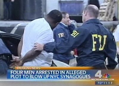 FBI agents escort a suspect  Wednesday in Newburgh, N.Y., in what authorities called a plot to detonate a bomb outside a Jewish temple. Associated Press/WNBC TV (Associated Press/WNBC TV / The Spokesman-Review)