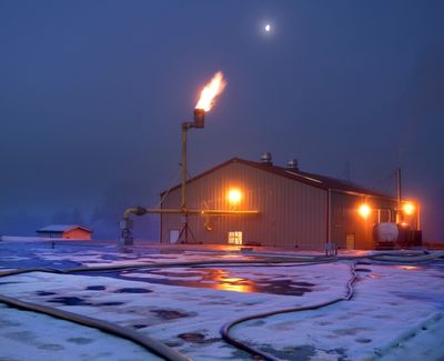 Methane gas not consumed by Qualco’s powerhouse flames off a giant stack outside the facility near Monroe, Wash. (Mike Siegel)
