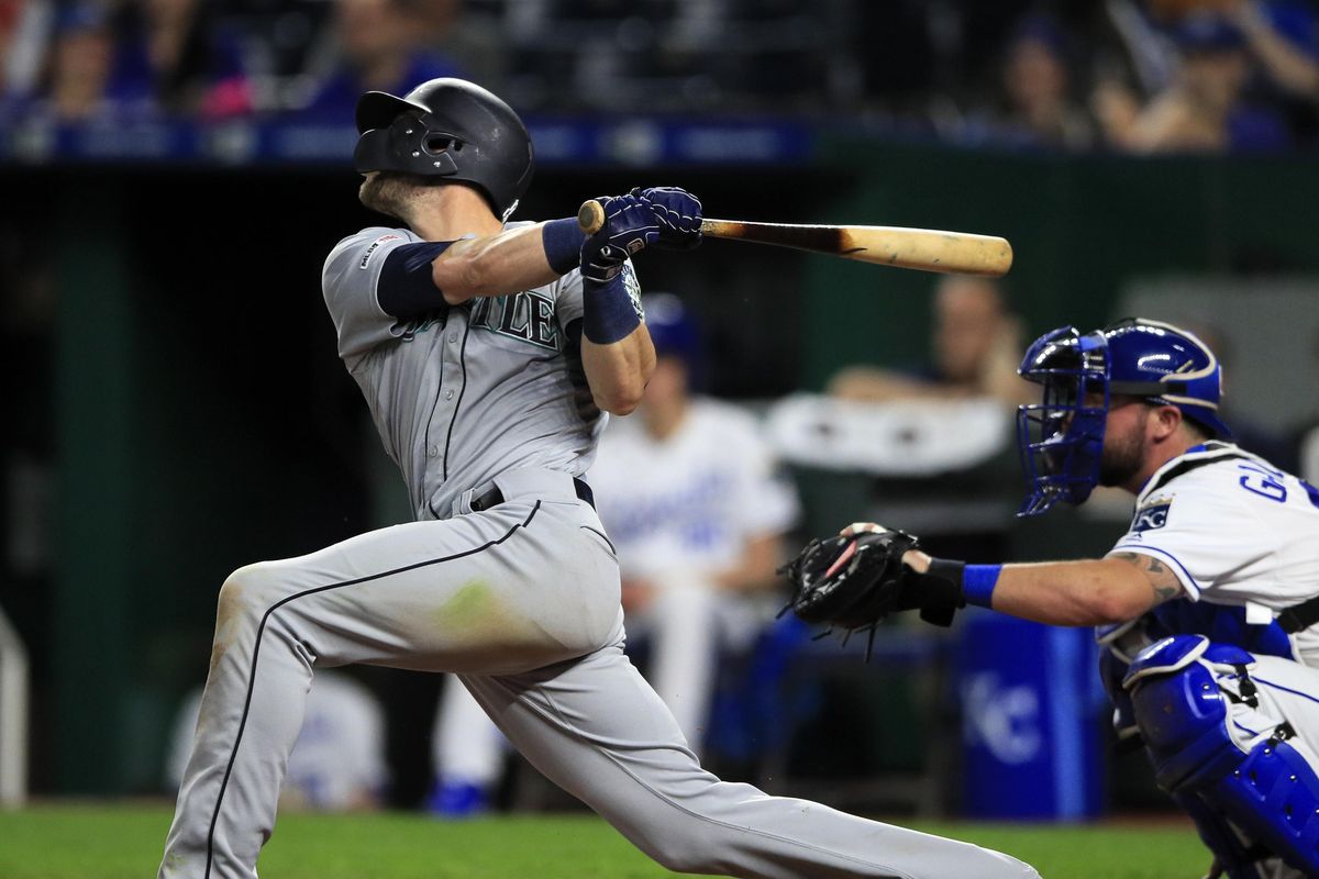 Seattle’s Mitch Haniger watches his solo home run during the ninth inning against the Kansas City Royals at Kauffman Stadium in Kansas City, Mo., on Wednesday.  The Mariners won 6-5. (Orlin Wagner / Associated Press)