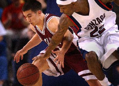 
Gonzaga guard Erroll Knight strips the ball from Brody Angley. 
 (Brian Plonka / The Spokesman-Review)
