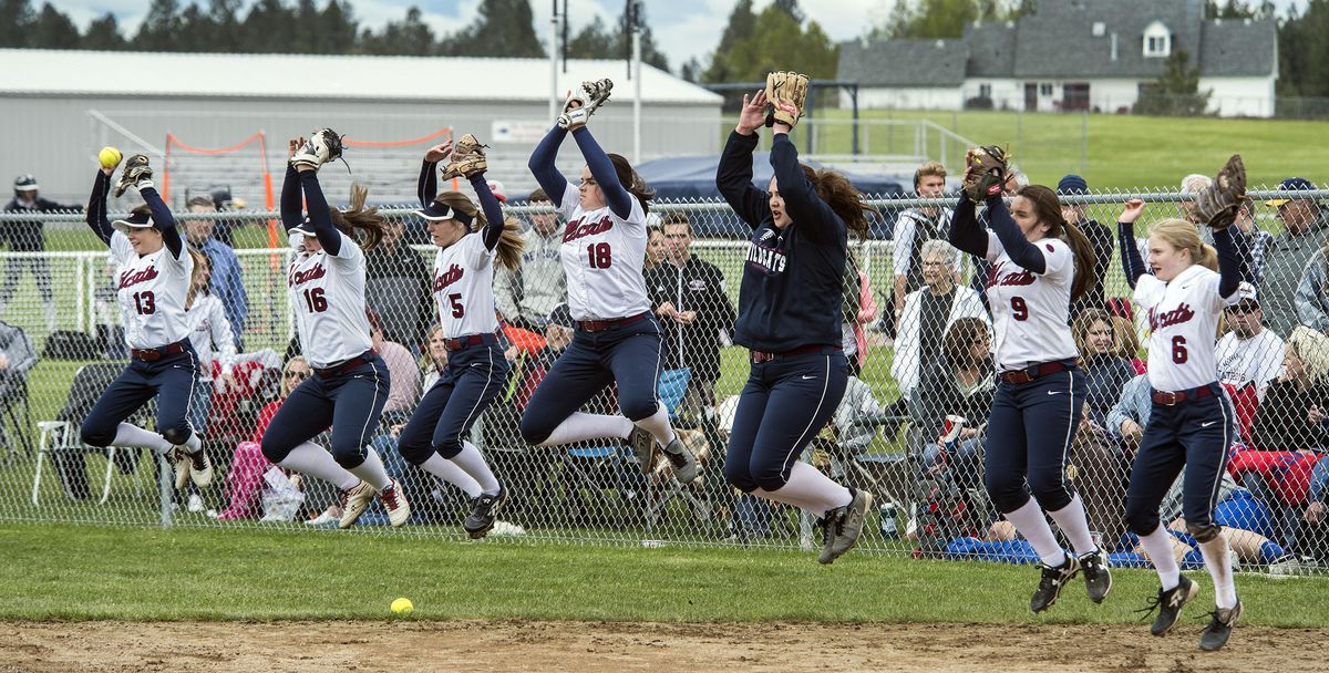 Members of the Mt. Spokane High School softball team participate in their “pineapple jump” while playing Shadle Park in the 3A subregional, May 17, 2017. (Dan Pelle / The Spokesman-Review)