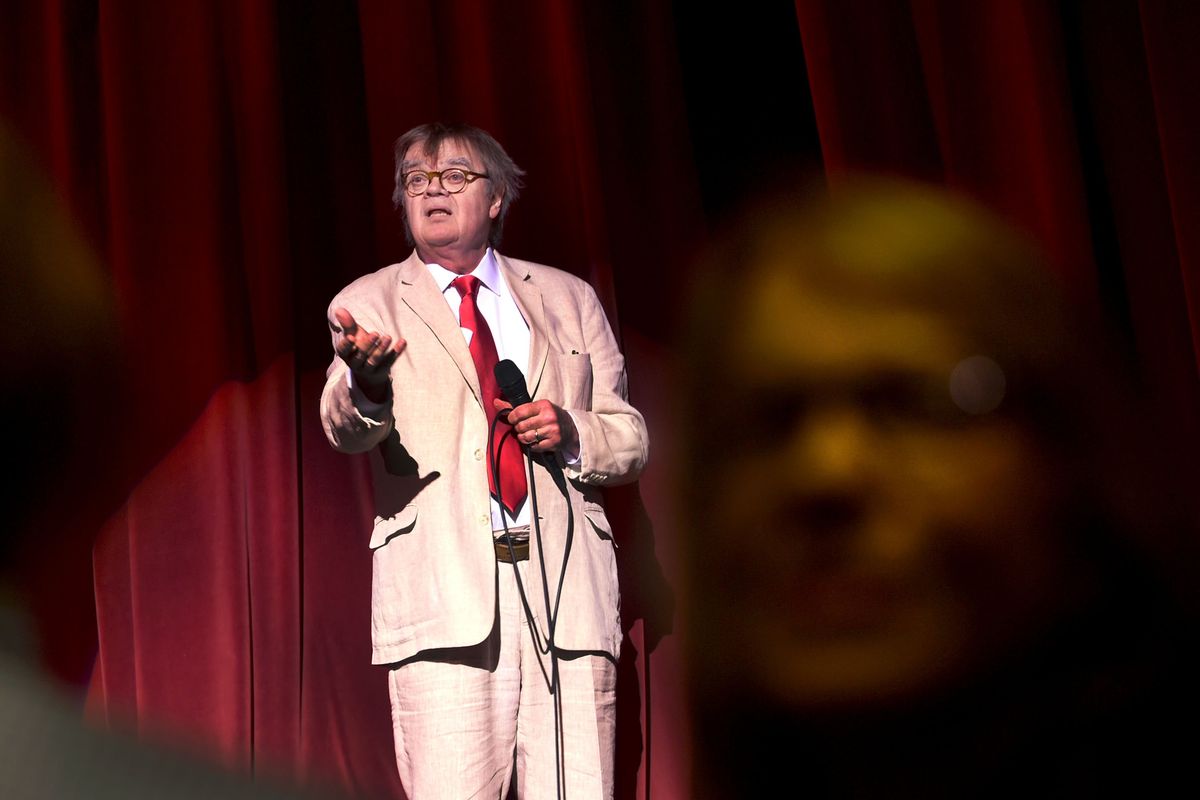 Garrison Keillor, of “A Prairie Home Companion,” sings along with the crowd before the start of his show at First Interstate Center for the Arts, then the INB Performing Arts Center, on May 14, 2016, in Spokane. Keillor returns to the city Saturday at the Fox.  (KATHY PLONKA/The Spokesman-Review)