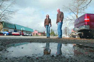 
Post Falls City Engineer Bill Melvin, right, and staff engineer Tiffany Reindel, left, are designing the improvements to Fourth Street. 
 (JESSE TINSLEY Photos / The Spokesman-Review)