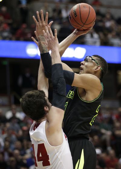 Isaiah Austin, right, was part of Baylor team that reached Sweet 16 in this year’s NCAA tourney. (Associated Press)