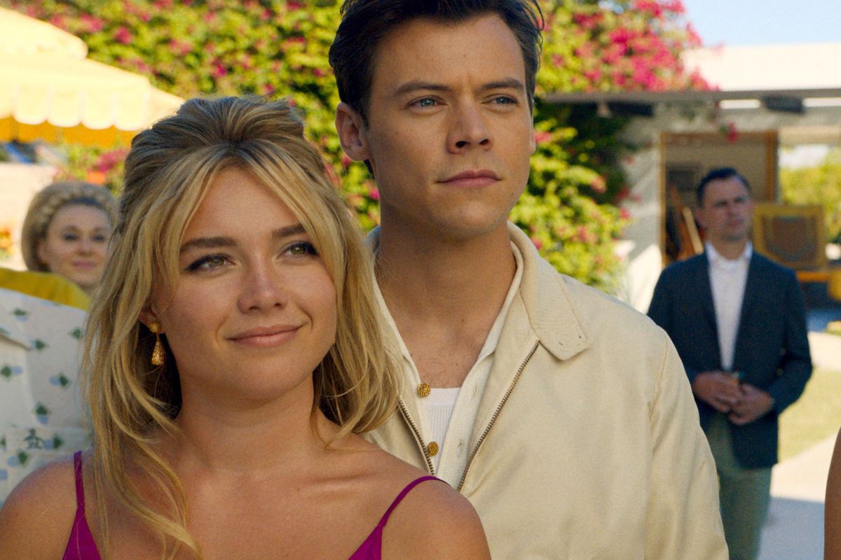 Florence Pugh, left, and Harry Styles in “Don’t Worry Darling.”  (Warner Bros. Pictures)