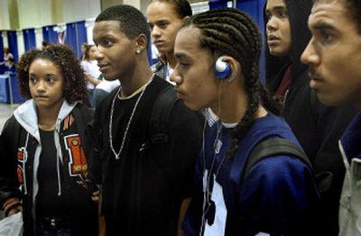 
 Students from Lewis and Clark High School listen to the sales pitch from DigiPen Institute of Technology on Tuesday during Spokane's National College Fair at the Spokane Convention Center. 
 (Brian Plonka / The Spokesman-Review)