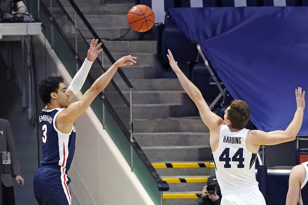 Gonzaga guard Andrew Nembhard, who leads the Bulldogs with 84 assists, shoots over BYU’s Connor Harding during the first half of Monday’s West Coast Conference game in Provo, Utah.  (Associated Press)