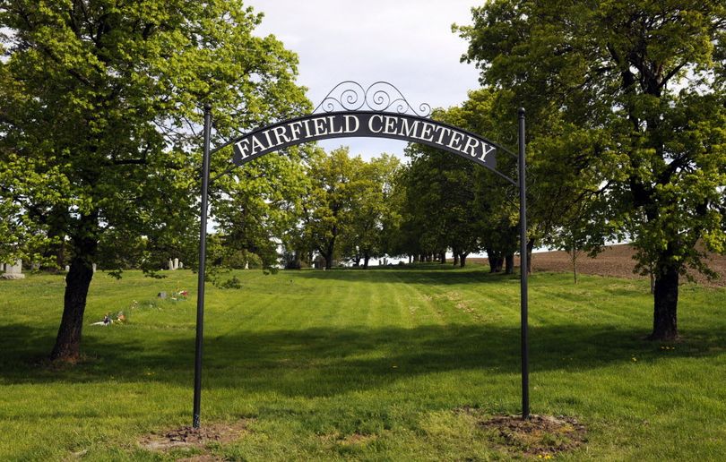 The original historic metal gates to the Fairfield Cemetery, damaged in an ice storm two years ago, have been restored and will be rededicated in a Memorial Day ceremony, Mon., May 30, 2011 (J. Bart Rayniak)