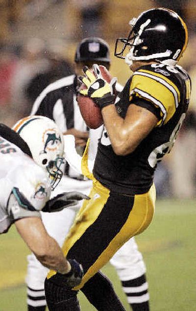 
Pittsburgh's Hines Ward hauls in a 7-yard touchdown pass. 
 (Associated Press / The Spokesman-Review)
