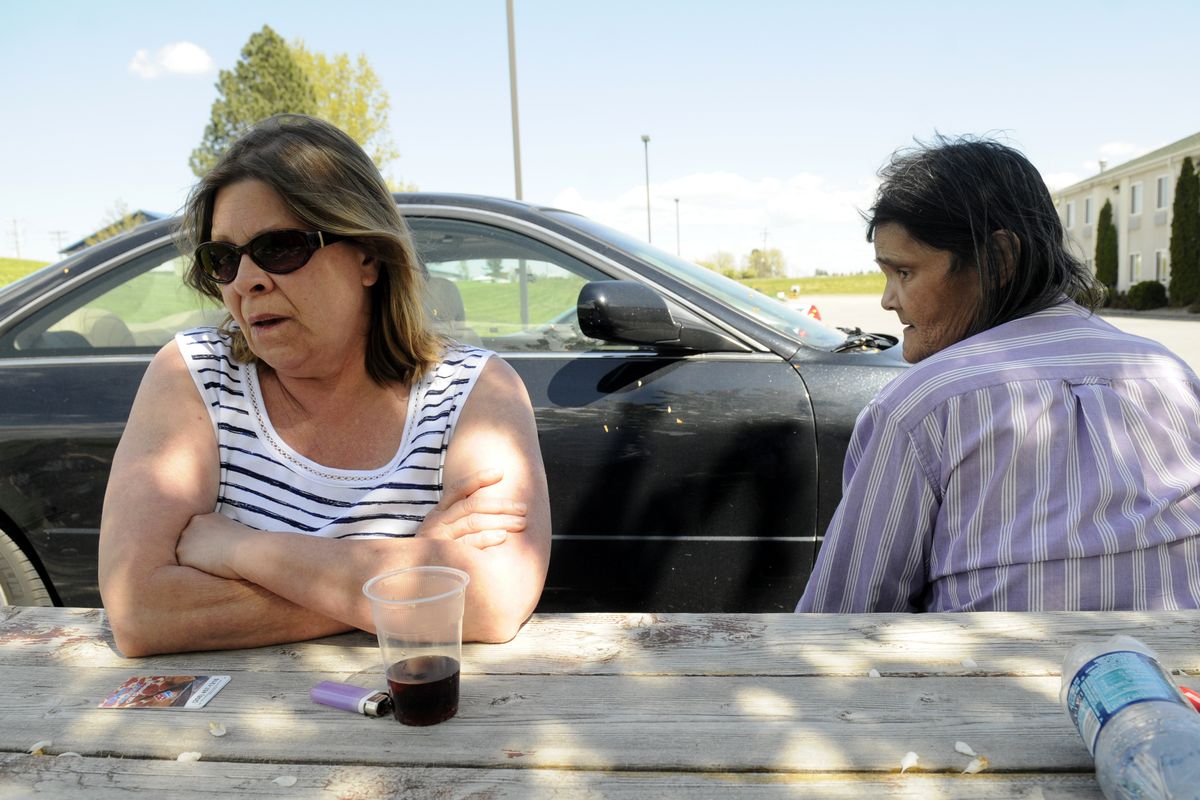 Betty Bachmeyier, left, and Rita (who declined to give her last name) sit outside the Sleep Inn in Post Falls on Wednesday. They have been staying there since the fire but will have to leave by the end of the week. The stay is costing Northeast Washington Housing Solutions about $1,400 a day.jesset@spokesman.com (Jesse Tinsley)