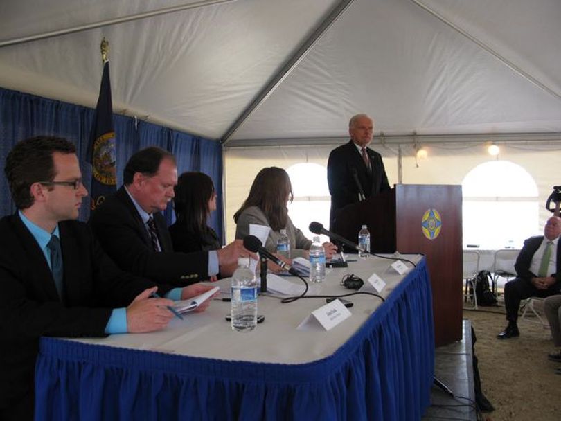 Four media witnesses, seated, and Idaho Corrections Director Brent Reinke speak immediately after Tuesday's execution of Richard Leavitt. (Betsy Russell)