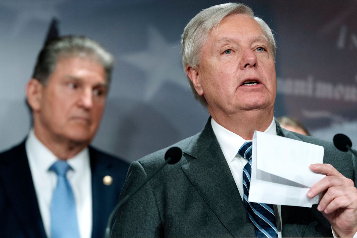 Sen. Lindsey Graham, R-S.C., right, with Sen. Joe Manchin, D-W.Va., speaks about their bill to ban Russian energy imports, Thursday, March 3, 2022, on Capitol Hill in Washington.  (Jacquelyn Martin)