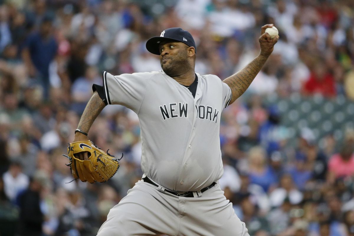 New York Yankees starting pitcher CC Sabathia throws to a Seattle Mariners batter during the first inning of a baseball game, Friday, July 21, 2017, in Seattle. (Ted S. Warren / Associated Press)
