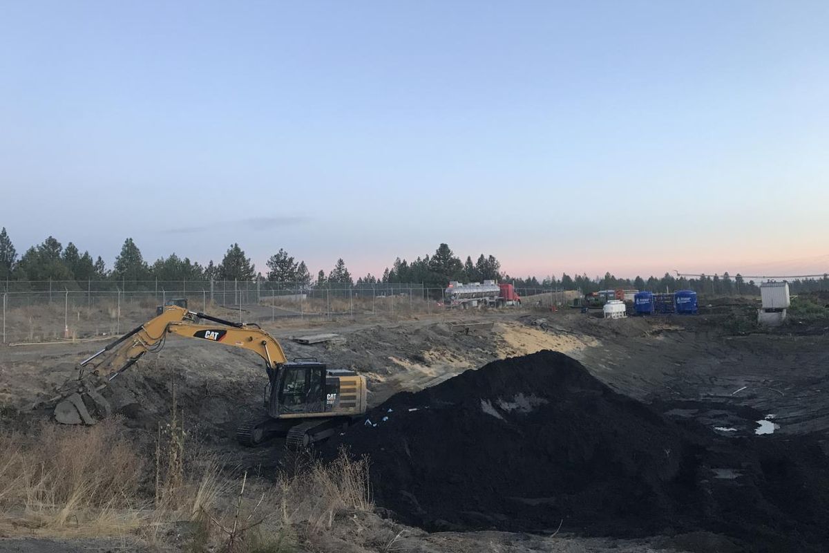 Crews work to excavate contaminated sediment from a settling pond near the site of the former Kaiser aluminum smelter near Mead in this photo taken Oct. 6, 2020.   (Courtesy Environmental Protection Agency)