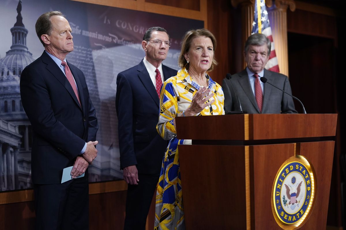 Sen. Shelley Moore Capito speaks at the Capitol in Washington, Thursday, May 27, 2021, as from left, Sen. Pat Toomey, R-Pa., Sen. Barrasso, R-Wy. and Sen. Roy Blunt, R-Mo., look on. Republican senators outlined a $928 billion infrastructure proposal Thursday, a counteroffer to President Joe Biden