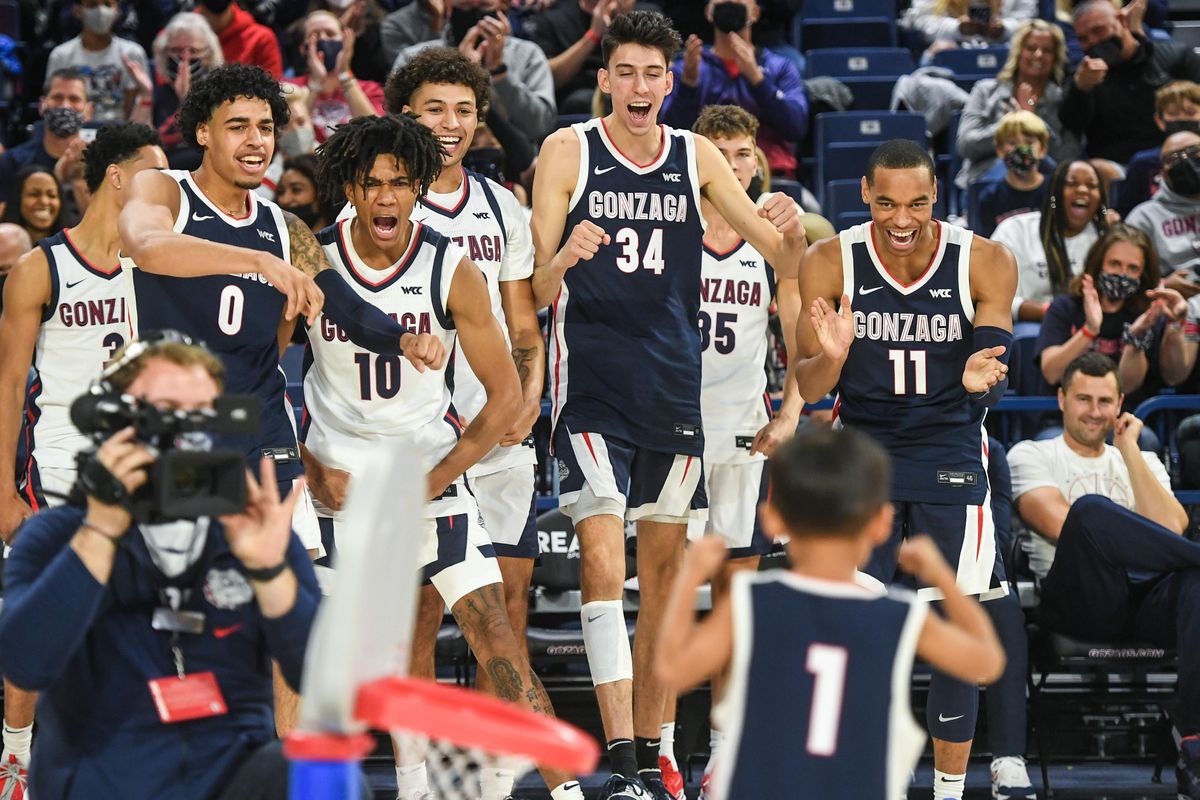 Gonzaga players erupt with excitement during a slam dunk contest for little kids during Kraziness in the Kennel, Saturday, Oct. 9, 2021.  (DAN PELLE/THE SPOKESMAN-REVIEW)