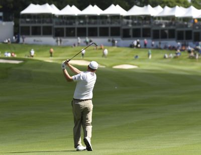 Chad Campbell hits his second shot on the 17th hole during the second-round of the John Deere Classic golf tournament Friday, July 14, 2017, in Silvis, Ill. (Todd Mizener / Associated Press)