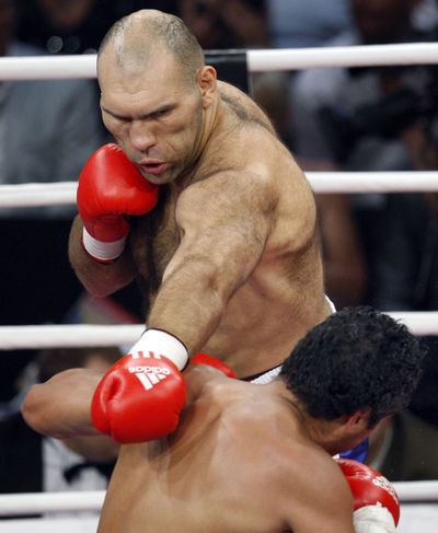 Nikolai Valuev from Russia, facing, beat John Ruiz for the second time.  (Associated Press / The Spokesman-Review)