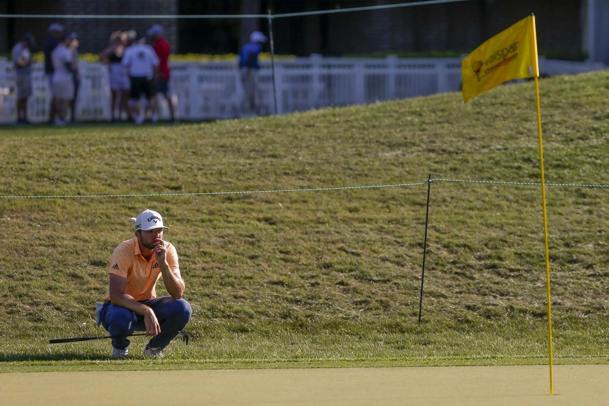 Sam Burns observes the green at the 15th hole during the PGA Valspar Championship golf tournament in Palm Harbor, Fla., Friday, April 30, 2021.  (Associated Press)