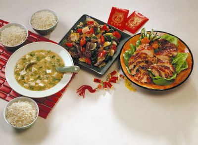 
Golden Egg Flower Corn Soup, Tomato Beef Stir-Fry With Basil and Sweet & Sour BBQ Chicken.
 (Family Features / The Spokesman-Review)