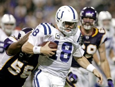 Peyton Manning rallied the Colts after the Vikings built a 15-0 lead late in the third quarter. (Associated Press / The Spokesman-Review)